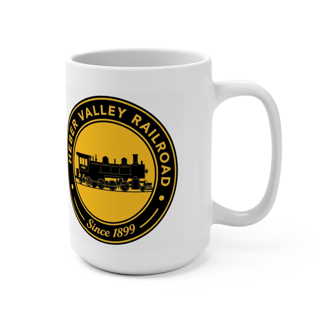 Right-handle view of a white 15 oz Heber Valley Railroad mug featuring a black-and-gold vintage steam train logo and “Since 1899.
