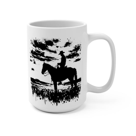White ceramic coffee mug featuring a bold black silhouette of a cowboy riding a galloping horse with dramatic ink splatter effects on a white background.