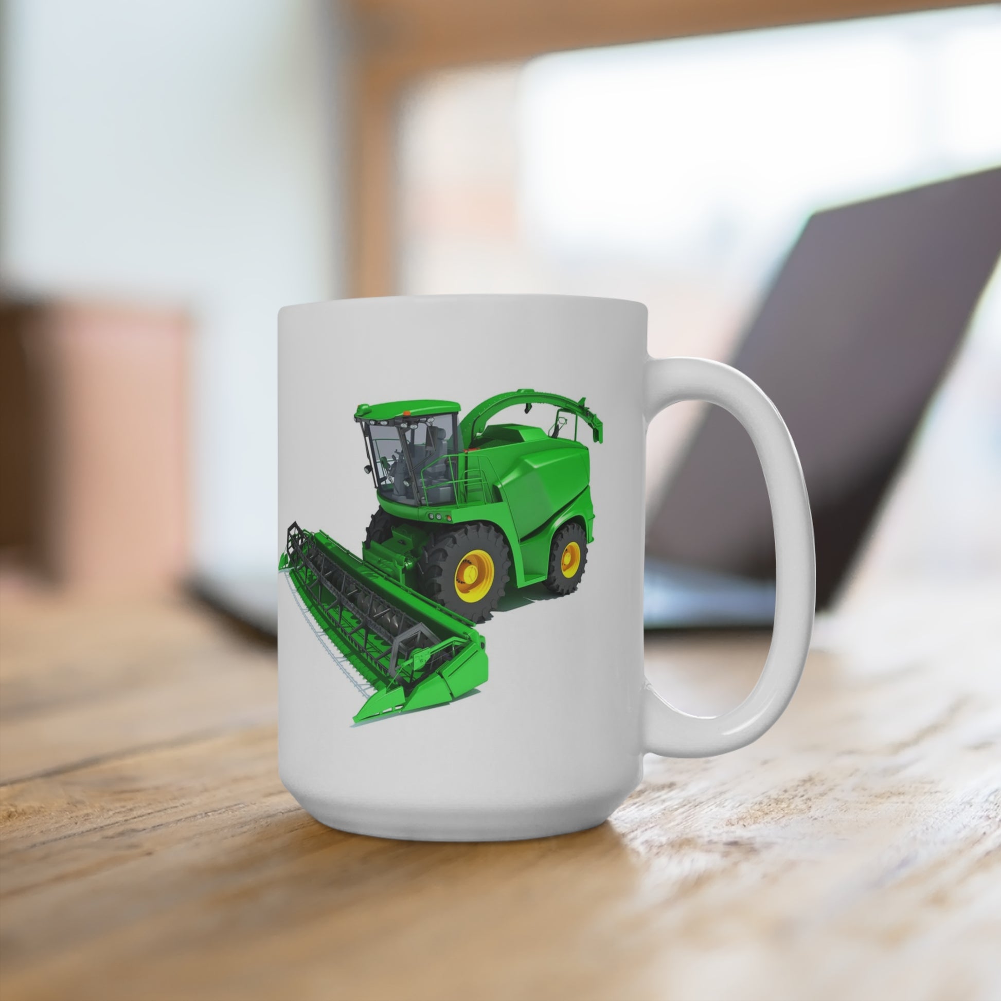 15 oz white ceramic coffee mug featuring a realistic green combine harvester with large header and yellow wheels on a white background.