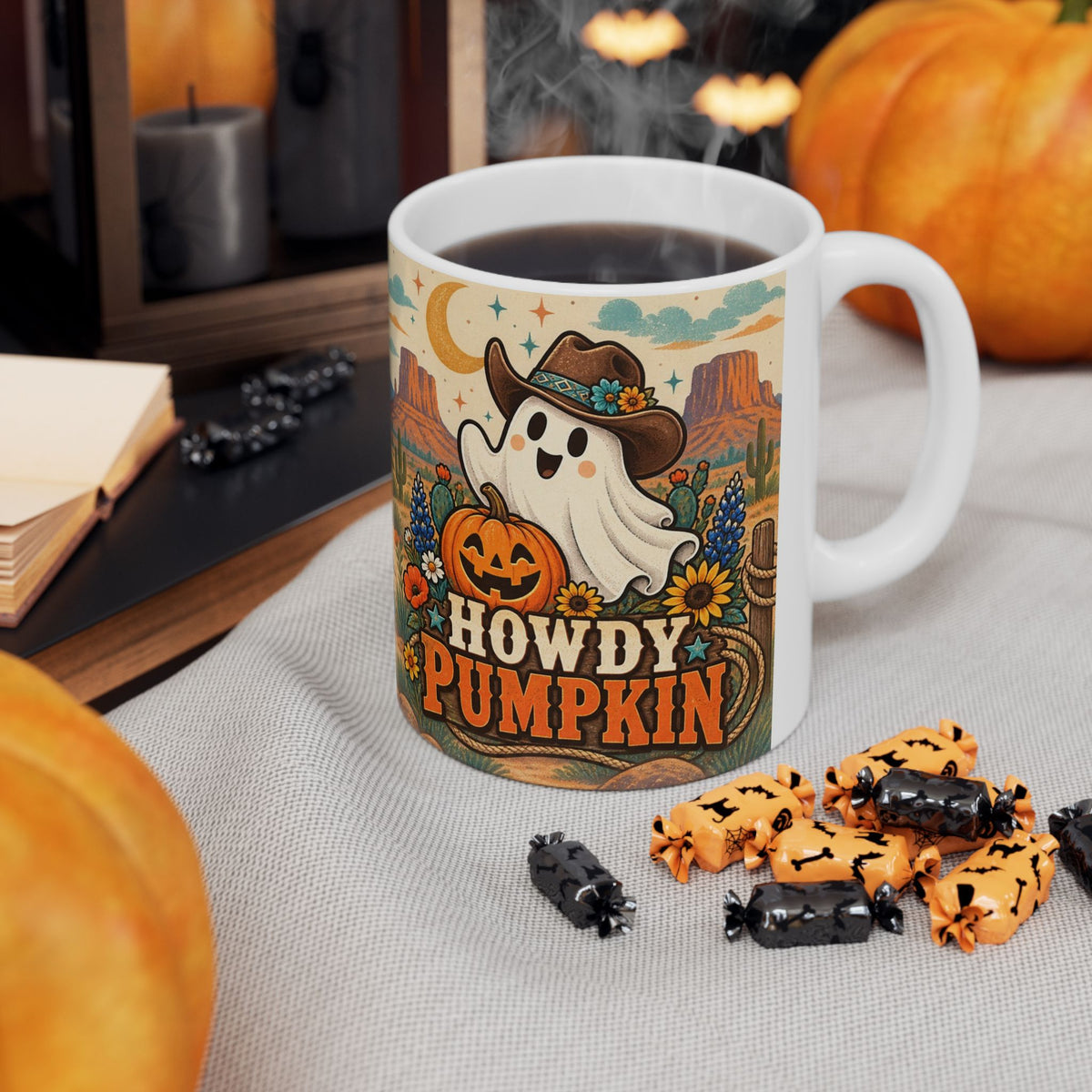 Howdy Pumpkin mug wraparound view showing desert mesas, cacti, crescent moons, wildflowers, and pumpkin artwork.