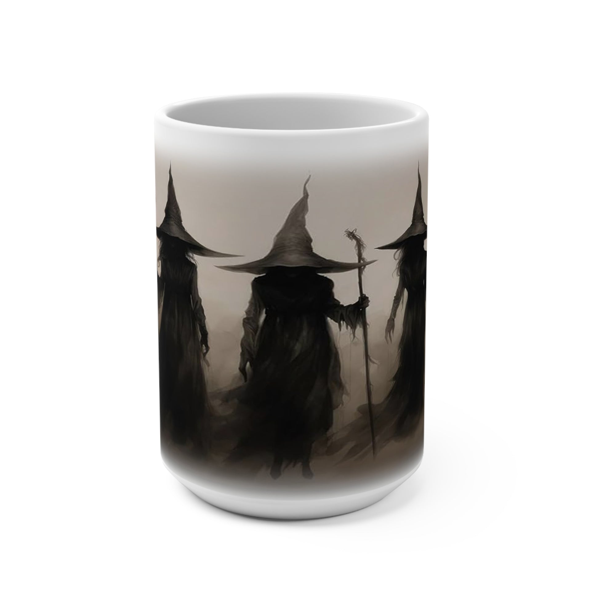 Bring a haunting touch to your coffee routine with this striking 15 oz ceramic mug featuring three shadowy witches in a moody, mist-filled scene. The dark, atmospheric artwork creates a mysterious gothic look that feels perfect for Halloween season, witchy décor lovers, and anyone drawn to eerie fantasy art.