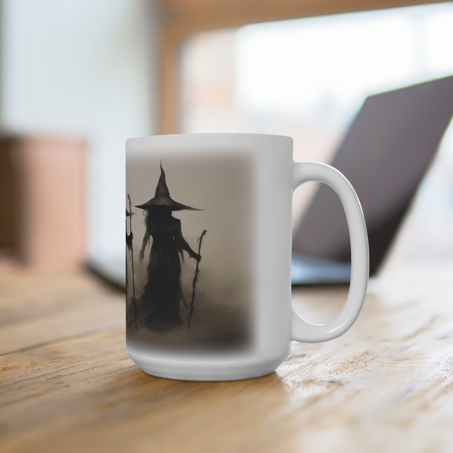 Bring a haunting touch to your coffee routine with this striking 15 oz ceramic mug featuring three shadowy witches in a moody, mist-filled scene. The dark, atmospheric artwork creates a mysterious gothic look that feels perfect for Halloween season, witchy décor lovers, and anyone drawn to eerie fantasy art.