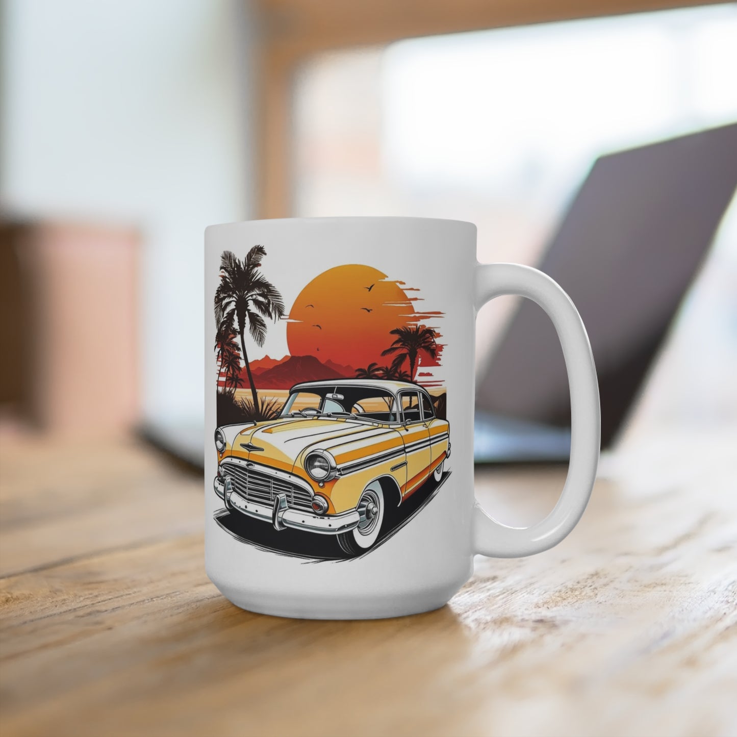 “Classic car sunset mug 15 oz showing vintage cruiser artwork with palm trees, desert landscape, and orange sun on white ceramic”